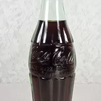 Atlanta Georgia vintage 6 oz full hobbleskirt Coke bottle with red Coca Cola Classic cap: Contents - Click to enlarge
