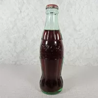 Peoria Illinois vintage 8 oz full hobbleskirt no refill Coke bottle with Coca Cola Classic cap: Front - Click to enlarge