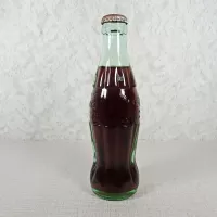 Peoria Illinois vintage 8 oz full hobbleskirt no refill Coke bottle with Coca Cola Classic cap: Left - Click to enlarge