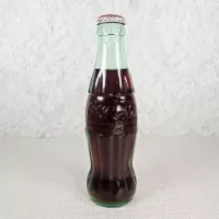 Springfield Illinois vintage 8 oz full hobbleskirt no refill Coke bottle with Coca Cola Classic cap: Front - Click to enlarge