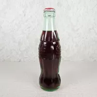 Springfield Illinois vintage 8 oz full hobbleskirt no refill Coke bottle with Coca Cola Classic cap: Right - Click to enlarge