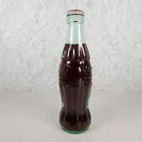 Springfield Illinois vintage 8 oz full hobbleskirt no refill Coke bottle with Coca Cola Classic cap: Left - Click to enlarge