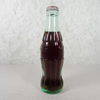 Ottumwa Iowa vintage 8 oz full hobbleskirt no refill Coke bottle with Coca Cola Classic cap: Right - Click to enlarge