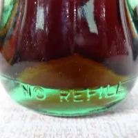 Ottumwa Iowa vintage 8 oz full hobbleskirt no refill Coke bottle with Coca Cola Classic cap: No Refill - Click to enlarge