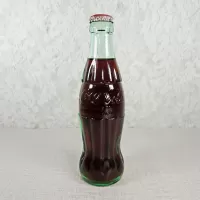 Louisville Kentucky vintage 8 oz full hobbleskirt no refill Coke bottle with Coca Cola Classic cap: Front - Click to enlarge