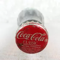Louisville Kentucky vintage 8 oz full hobbleskirt no refill Coke bottle with Coca Cola Classic cap: Top - Click to enlarge