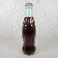 New Orleans Louisiana vintage 8 oz full hobbleskirt no refill Coke bottle with Coca Cola Classic cap: Right - Click to enlarge