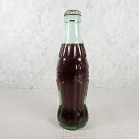 Boston Massachusetts vintage 8 oz full hobbleskirt no refill Coke bottle with Coca Cola Classic cap: Left - Click to enlarge