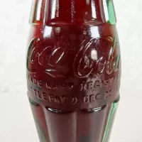 Boston Massachusetts vintage 8 oz full hobbleskirt no refill Coke bottle with Coca Cola Classic cap: patD - Click to enlarge