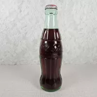 St Louis Missouri vintage 8 oz full hobbleskirt no refill Coke bottle with Coca Cola Classic cap: Front - Click to enlarge