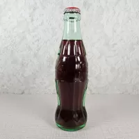 St Louis Missouri vintage 8 oz full hobbleskirt no refill Coke bottle with Coca Cola Classic cap: Left - Click to enlarge