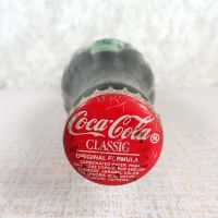 Kearney Nebraska vintage 6 oz full hobbleskirt Coke bottle with red Coca Cola Classic cap: Top - Click to enlarge