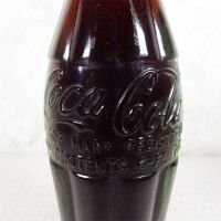 Scottsbluff Nebraska vintage 6 oz full hobbleskirt Coke bottle with red Coca Cola Classic cap: Contents - Click to enlarge