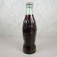 Las Vegas Nevada vintage 6 oz full hobbleskirt Coke bottle with red Coca Cola Classic cap: Front - Click to enlarge