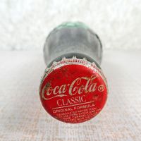 Las Vegas Nevada vintage 8 oz full hobbleskirt Coke bottle with red Coca Cola Classic cap: Top - Click to enlarge