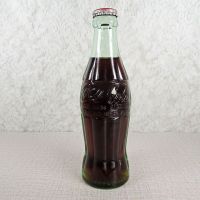 Charlotte North Carolina vintage 6 oz full hobbleskirt Coke bottle with red Coca Cola Classic cap: Front - Click to enlarge