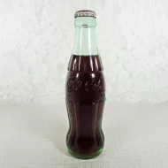 Austin Texas vintage 8 oz full hobbleskirt no refill Coke bottle with Coca Cola Classic cap: Front