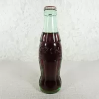 Austin Texas vintage 8 oz full hobbleskirt no refill Coke bottle with Coca Cola Classic cap: Front - Click to enlarge
