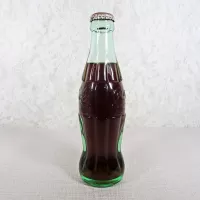 Austin Texas vintage 8 oz full hobbleskirt no refill Coke bottle with Coca Cola Classic cap: Right - Click to enlarge