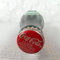 Austin Texas vintage 8 oz full hobbleskirt no refill Coke bottle with Coca Cola Classic cap: Top - Click to enlarge