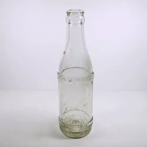 Vintage 1947 Embossed Property of Coca Cola Bot. Co Tiffin O. thick clear glass bottle. Four stars on neck: Front