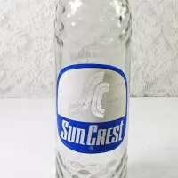 1967 Sun Crest Long Neck 10 oz Vintage ACL Soda Bottle. Blue white graphics. Raised ovals. #5a: Logo - Click to enlarge