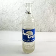 1961 Sun Crest Beverages 10 oz vintage ACL Soda Bottle. Blue white graphics. Raised ovals. #4: Front