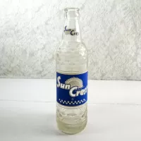 1961 Sun Crest Beverages 10 oz vintage ACL Soda Bottle. Blue white graphics. Raised ovals. #4: Front - Click to enlarge