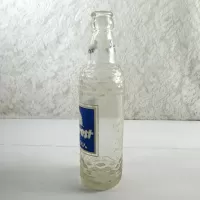 1961 Sun Crest Beverages 10 oz vintage ACL Soda Bottle. Blue white graphics. Raised ovals. #4: Left - Click to enlarge
