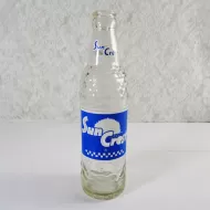 Sun Crest Beverages 10 oz Vintage ACL Soda Bottle. Blue white graphics. Raised ovals above and below label #4a: Front