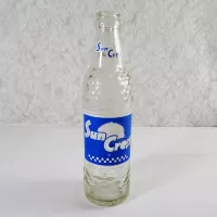 Sun Crest Beverages 10 oz Vintage ACL Soda Bottle. Blue white graphics. Raised ovals above and below label #4a: Front - Click to enlarge