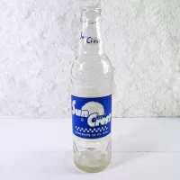 1966 Sun Crest 10 oz Vintage ACL Soda Bottle. Blue white graphics. Raised ovals above and below label #4b: Front - Click to enlarge