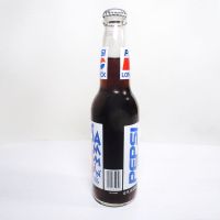 Shaq Jammin’ full 12 oz. Longneck Pepsi bottle from his 1992-1993 rookie season with the Orlando Magic: Left Side View - Click to enlarge