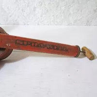 Vintage Spra-Well bug sprayer with metal tank and wood handle. 11 inch tube. Orange with black accents: Tube - Click to enlarge