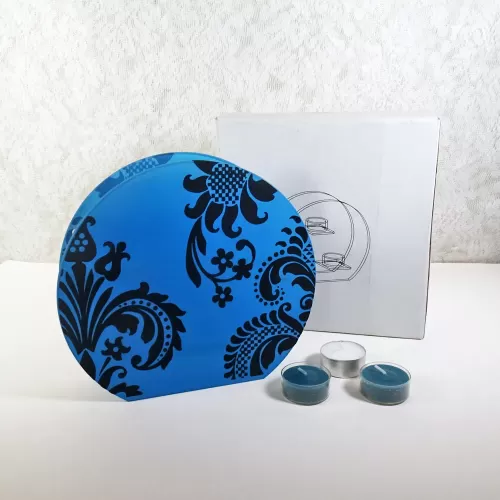 Round top tealight candle holder with blue frosty glass and darker velvet accents. Three candles included: With Box View