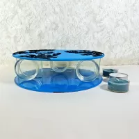 Round top tealight candle holder with blue frosty glass and darker velvet accents. Three candles included: Top View - Click to enlarge