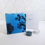 Square two sided blue frosty glass tealight candle holder with darker blue velvet accents. 2 candles included: With Box View