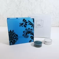 Square two sided blue frosty glass tealight candle holder with darker blue velvet accents. 2 candles included: With Box View - Click to enlarge