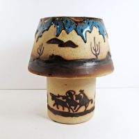 Cowboys on horseback with lassos ceramic clay tealight candle lamp. Two piece southwestern theme candle holder: Front View - Click to enlarge