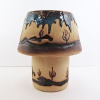 Cowboys on horseback with lassos ceramic clay tealight candle lamp. Two piece southwestern theme candle holder: Side View - Click to enlarge