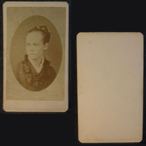 Antique CDV Carte De Visite: Woman from the shoulder area up with a braided bun, straight line smile and ruffled collar: Front and Back View