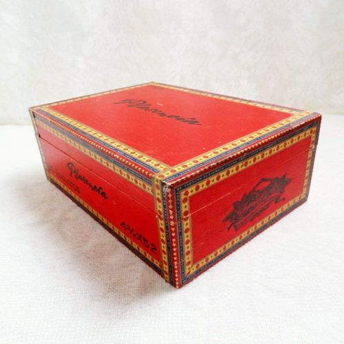 Plasencia empty wood cigar box with colorful paper accents. Gold hinges and contrasting black graphics: Main View