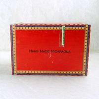 Plasencia empty wood cigar box with colorful paper accents. Gold hinges and contrasting black graphics: Bottom View - Click to enlarge