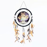 Dream catcher featuring a round canvas depicting three wolves surrounding a moon filled sky, more wolves on the ground: Front View - Click to enlarge
