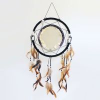 Dream catcher featuring a round canvas depicting three wolves surrounding a moon filled sky, more wolves on the ground: Back View - Click to enlarge