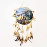 Drum style dream catcher showing an Indian raising his ceremonial stick to the sky. Buffalo head in the clouds: Front View