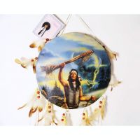 Drum style dream catcher showing an Indian raising his ceremonial stick to the sky. Buffalo head in the clouds: Closeup View - Click to enlarge