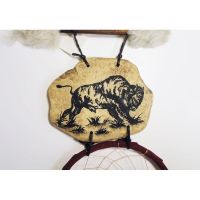 Dream Catcher with image of a buffalo imprinted on a rock hanging from a stick and webbed hoops. Feathers and beads: Closeup View - Click to enlarge