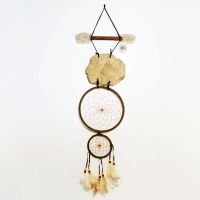 Dream Catcher with image of an eagle head imprinted on a rock hanging from a stick and webbed hoops. Feathers and beads: Back View - Click to enlarge