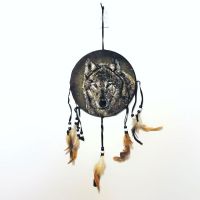 Dream Catcher wolf head on a fabric print with feathers and beads hanging from strips. Dreamcatcher Wall Hanging: Front View - Click to enlarge